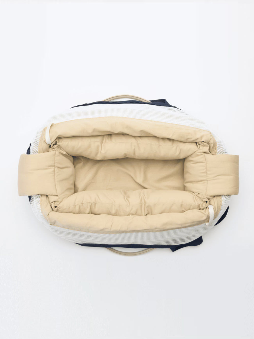 Interior view of the Bagel Bag showing the removable and washable cushion.