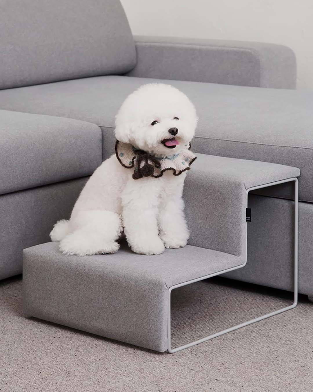 dog stairs placed next to a sofa in the living room
