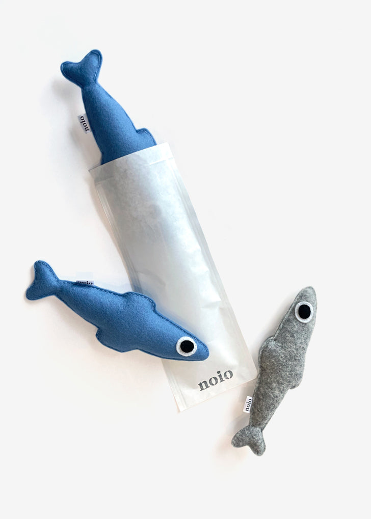 Anchovy-shaped catnip toy in its packaging.