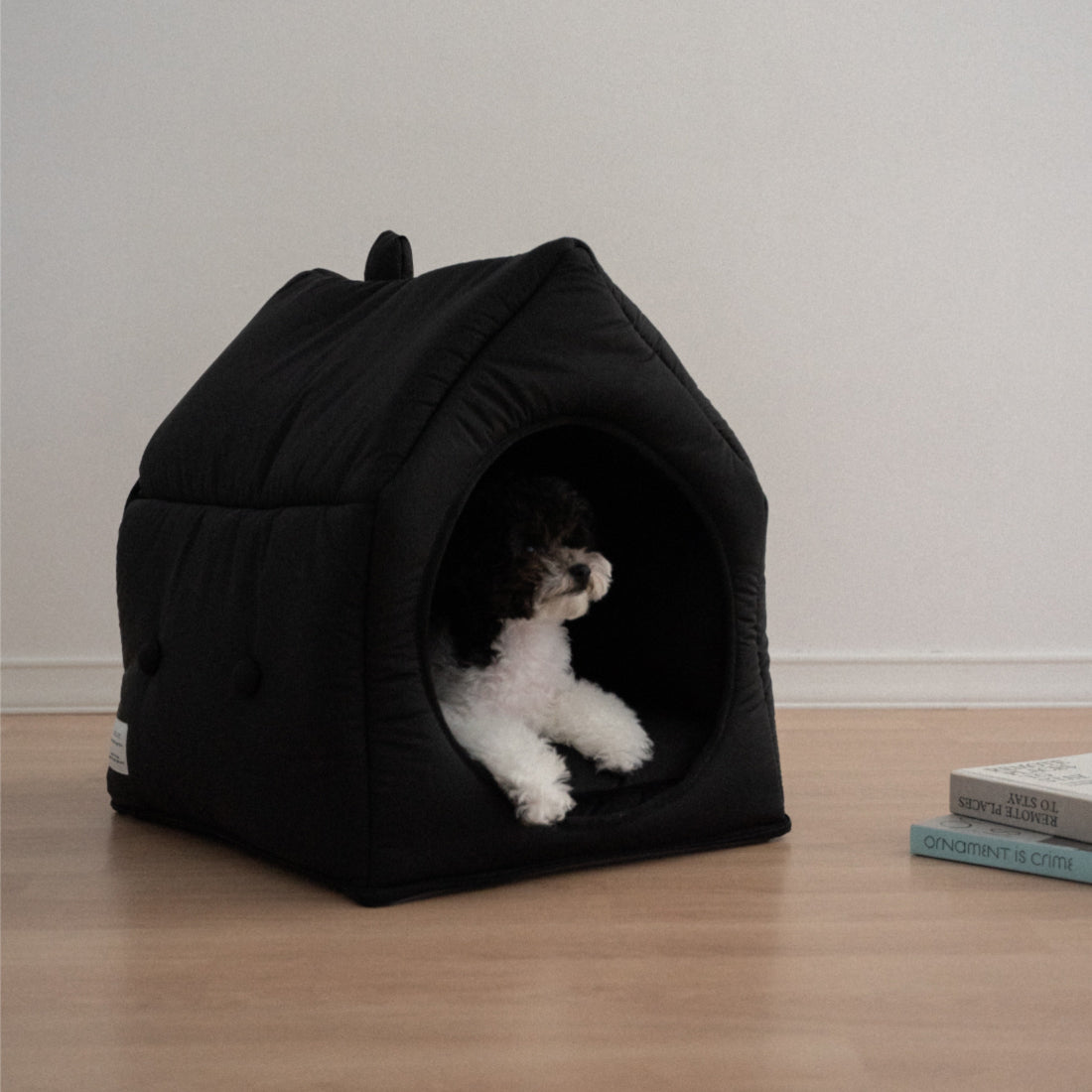 Informal House pet bed with a pet peeking out, indicating its comfortable and secure environment.