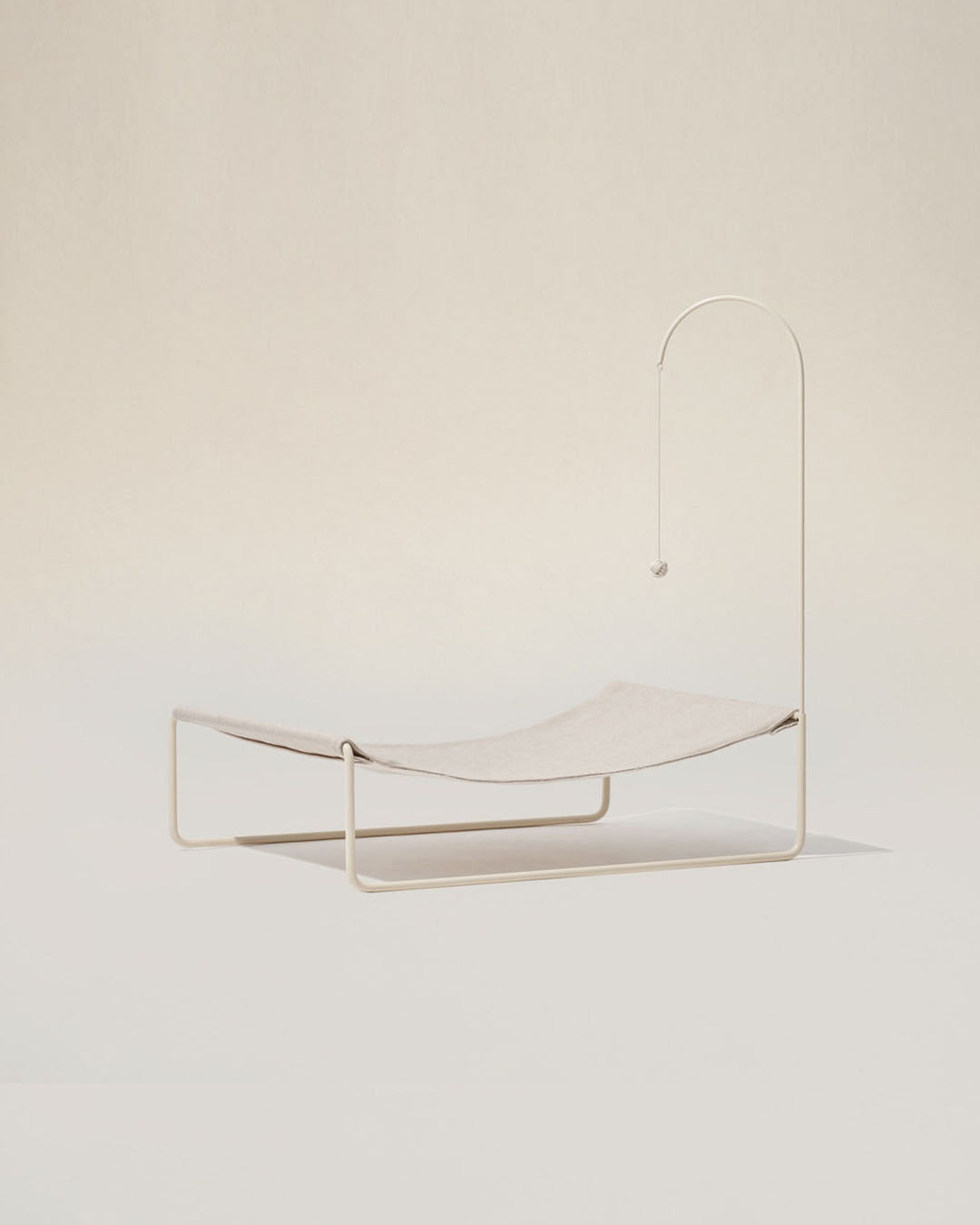 Lullaby Hammock with a sleek steel frame and premium thick fabric, designed as an elegant pet furniture piece.